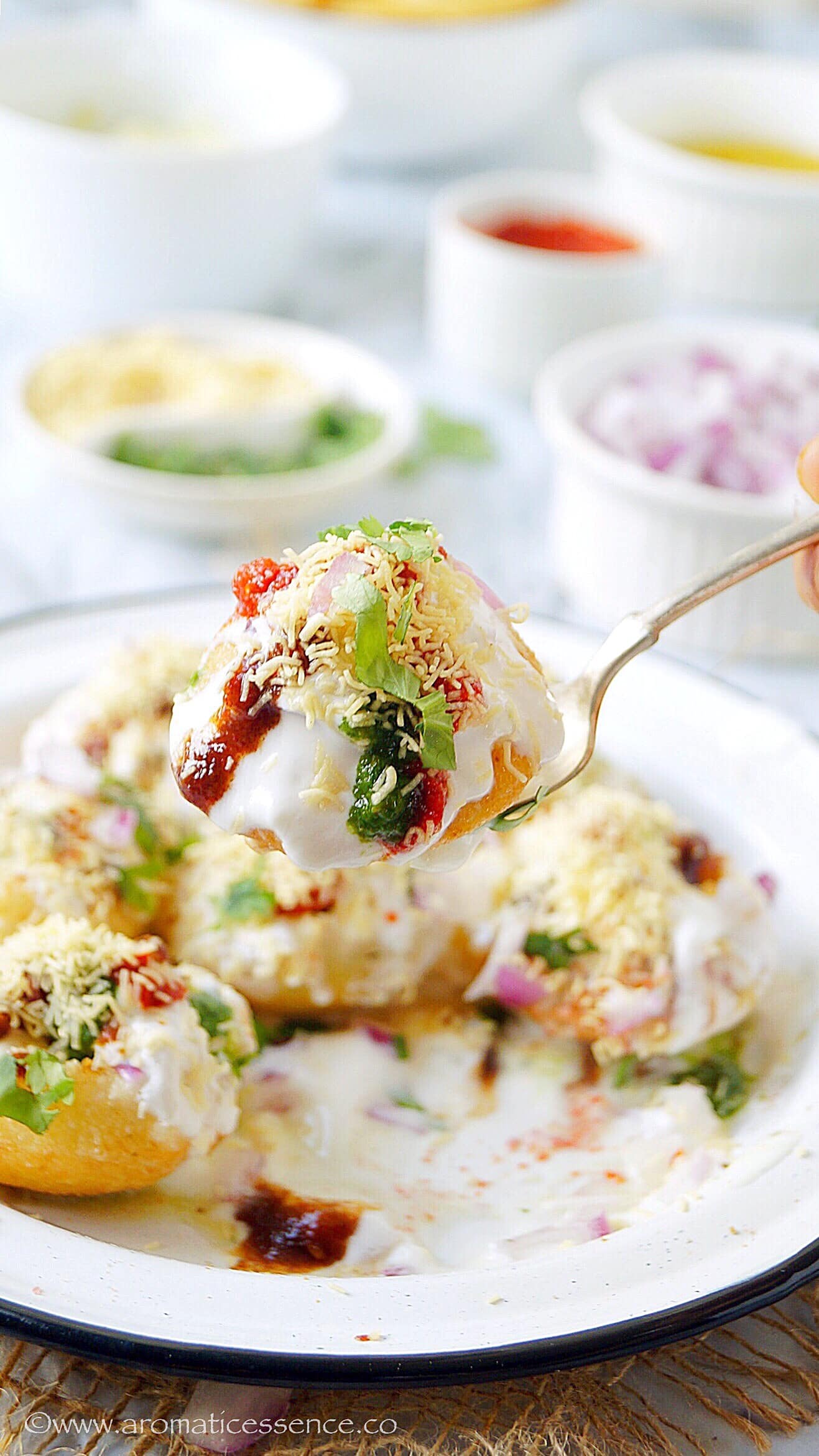 Dahi puri with yogurt and chutneys